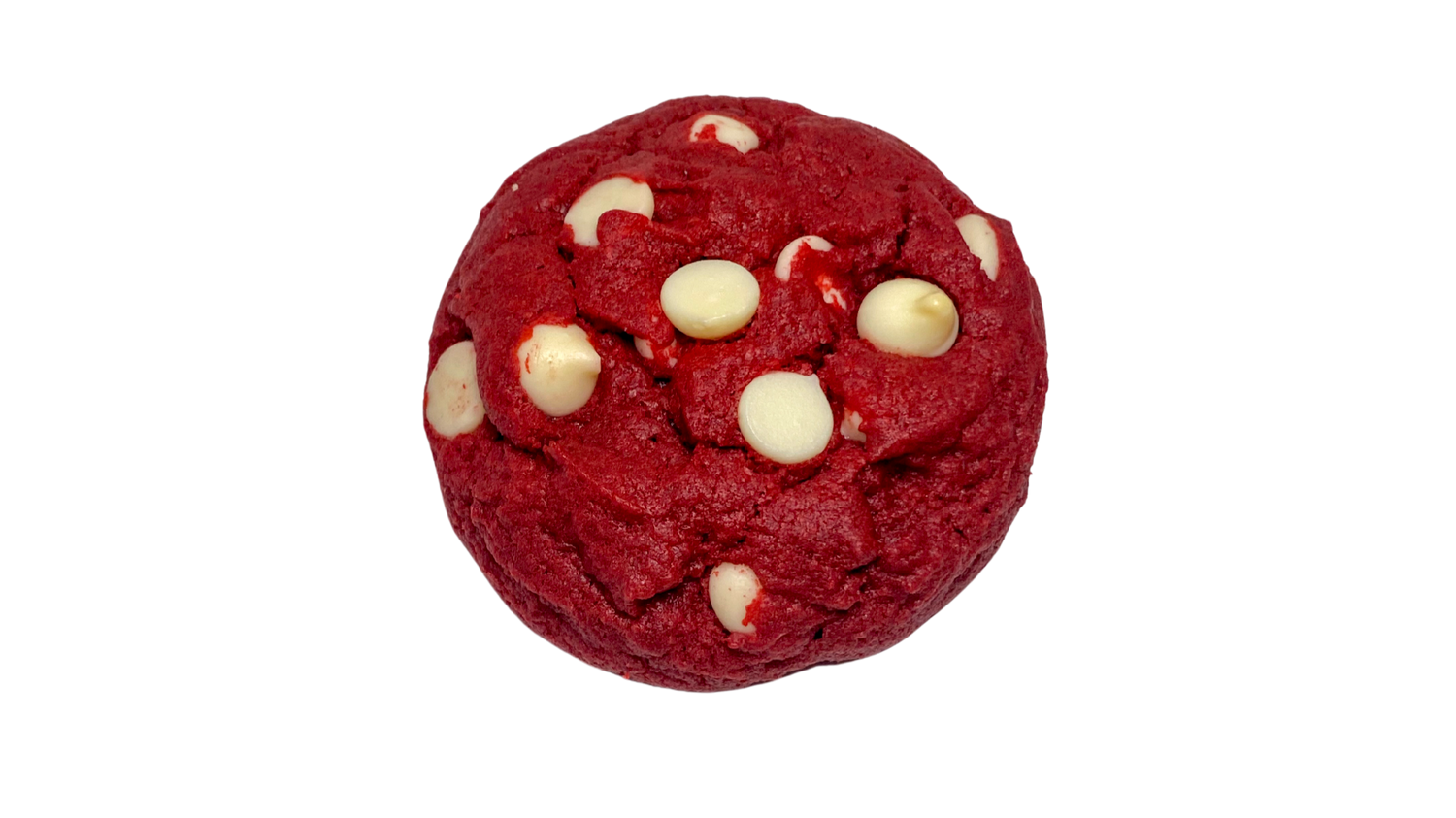 A gourmet red velvet cookie, available for delivery. It is a brilliant red color with vibrant white chocolate chips.