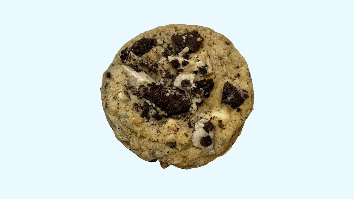 A gourmet Cookies and cream cookie, available for delivery. It's topped with oreo crumbles.