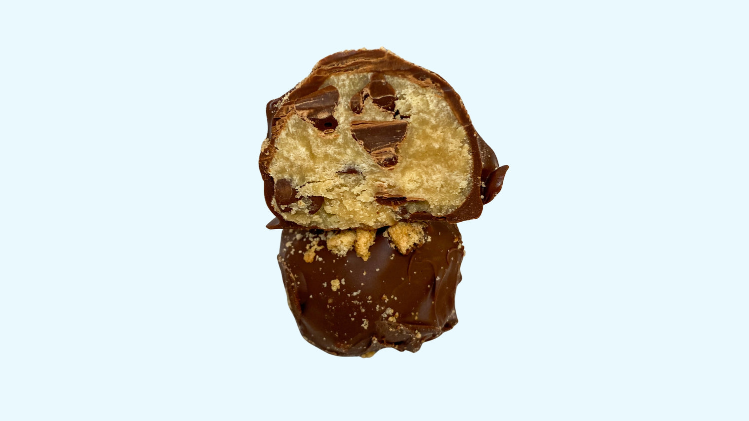 a giant stuffed truffle filled with cookie dough, ready for delivery.
